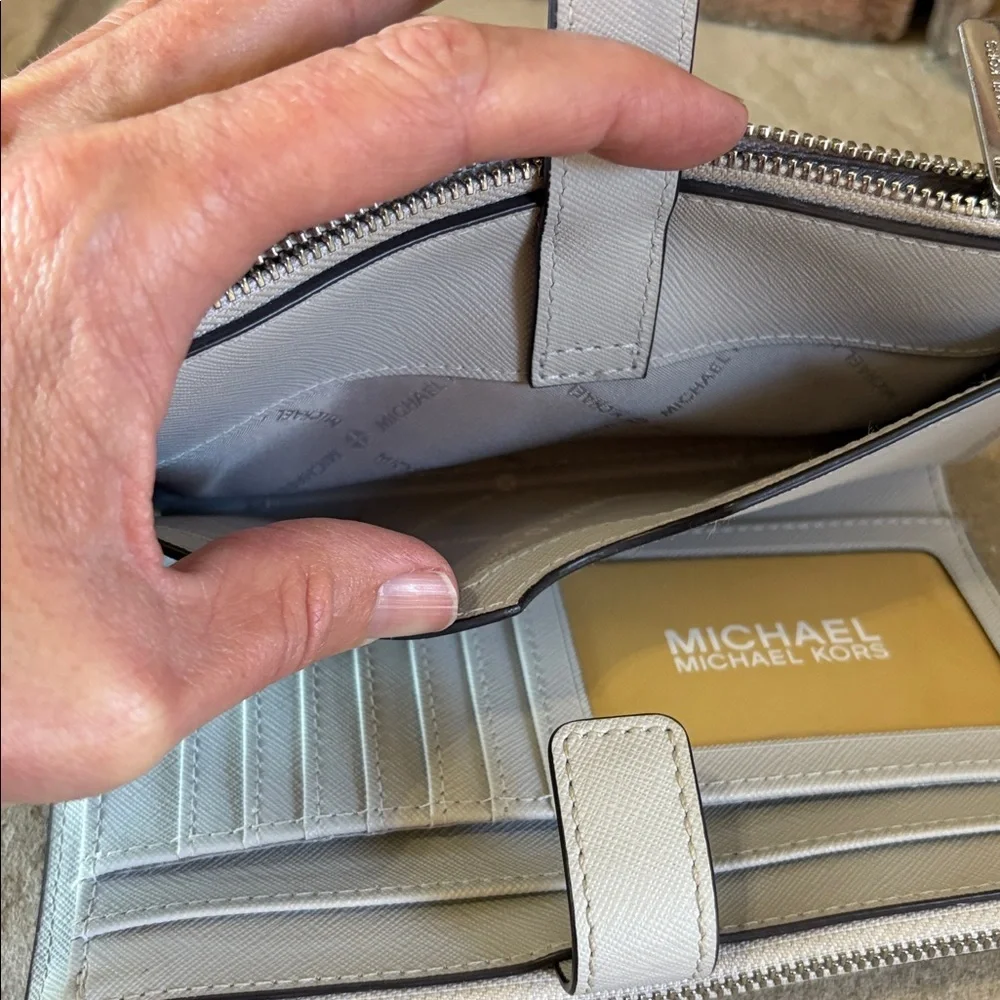 Michael Kors light grey wristlet/wallet